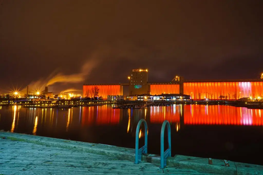 Aurora Borealis permanent lighting installation Old Grain Silos in Quebec City in fall