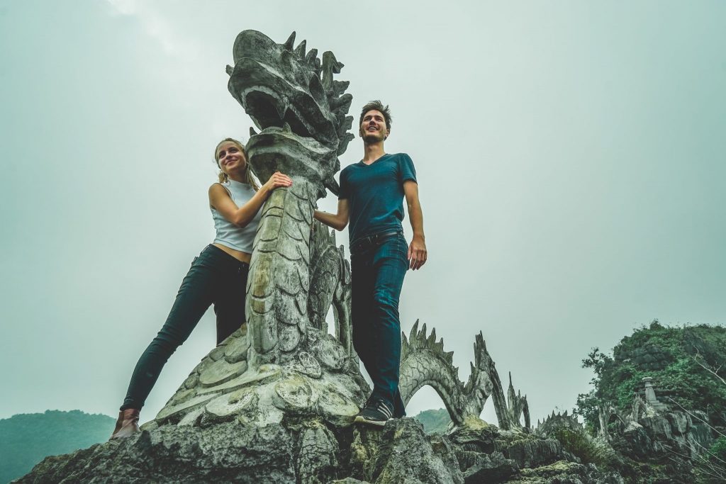 Beautiful People With Dragon Atop Mua Cave Vietnam